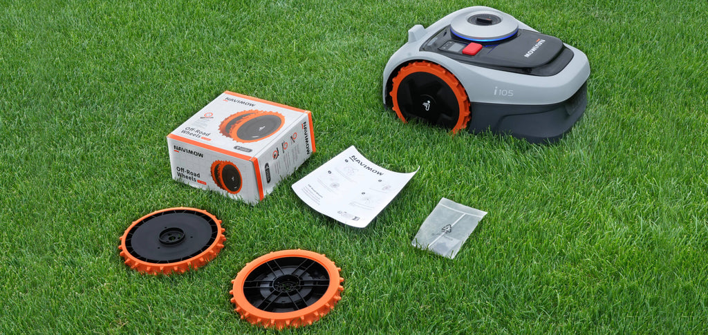 Navimow i105 robot lawn mower with wheels and boxed kit.